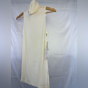 NWT Elegant Cream Sleeveless Turtleneck Top in Luxuriously Soft Sheer Material